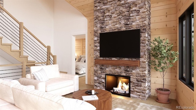 32778 Janelle Ln, Golden, CO 80403 - living area with stairs, a fireplace, wood finished floors, vaulted ceiling, and wood ceiling