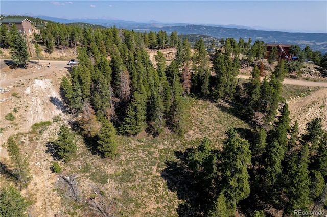 32778 Janelle Ln, Golden, CO 80403 - bird's eye view with a mountain view and a view of trees