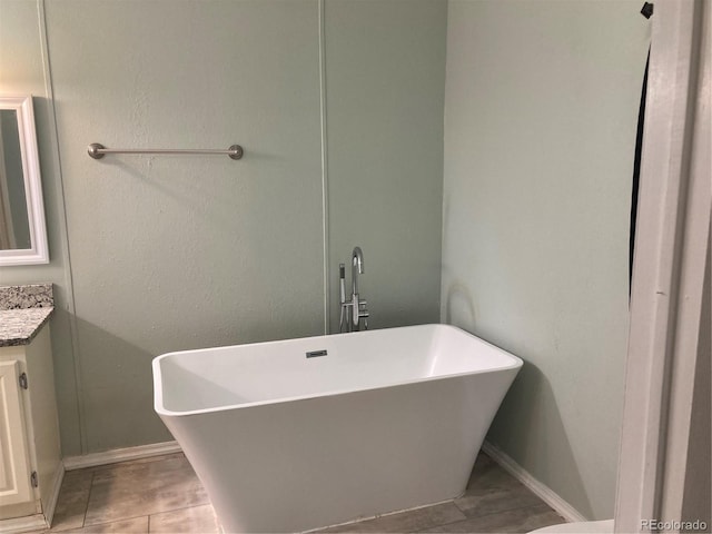 1103 Stage Dr, Fort Lupton, CO 80621 - full bath with vanity and a soaking tub