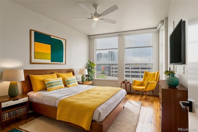 2680 Blake St Unit 4, Denver, CO 80205 - bedroom featuring wood finished floors and a ceiling fan