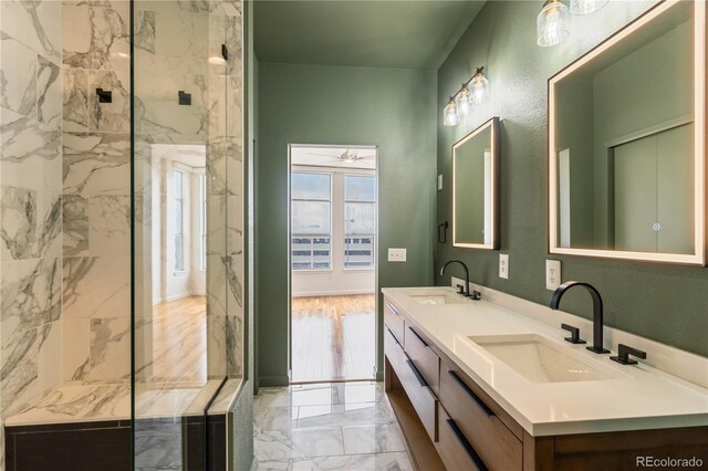 2680 Blake St Unit 4, Denver, CO 80205 - full bath with double vanity, a marble finish shower, marble finish floors, and a ceiling fan