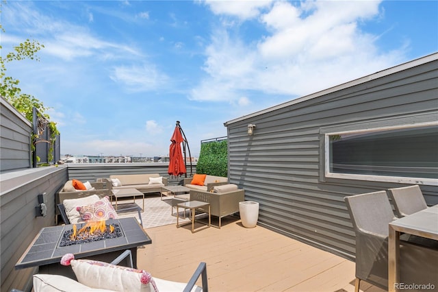2680 Blake St Unit 4, Denver, CO 80205 - wooden terrace with an outdoor living space with a fire pit