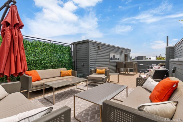 2680 Blake St Unit 4, Denver, CO 80205 - view of patio featuring outdoor lounge area and a wooden deck
