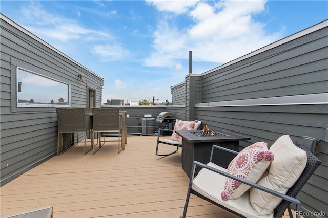 2680 Blake St Unit 4, Denver, CO 80205 - deck featuring a fire pit and a grill