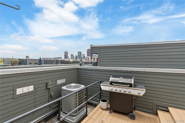 2680 Blake St Unit 4, Denver, CO 80205 - wooden deck featuring a view of skyline