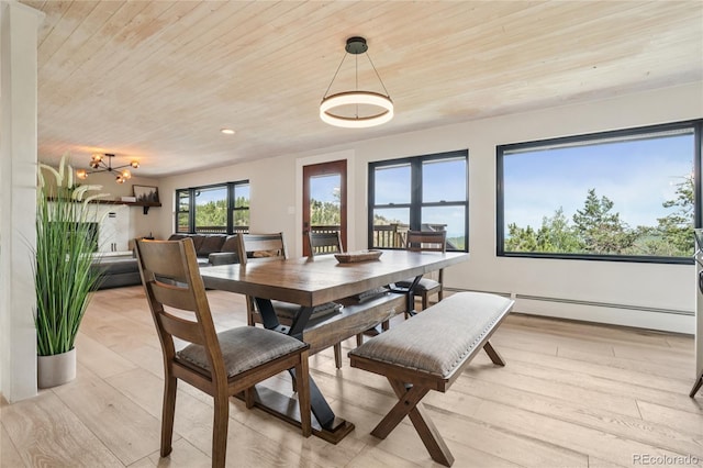 8940 S Brandenburger Dr, Morrison, CO 80465 - dining area with wood ceiling, a baseboard radiator, light wood finished floors, and recessed lighting