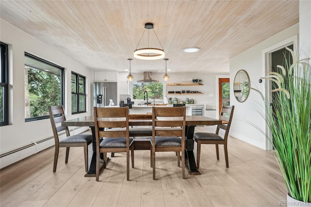 8940 S Brandenburger Dr, Morrison, CO 80465 - dining space featuring wood ceiling and light wood-type flooring