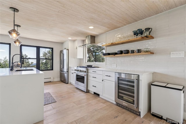 8940 S Brandenburger Dr, Morrison, CO 80465 - kitchen with wine cooler, premium appliances, wall chimney range hood, wood ceiling, and baseboard heating