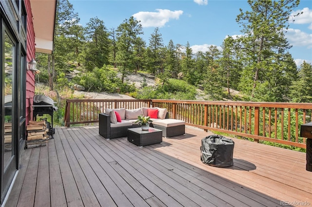 8940 S Brandenburger Dr, Morrison, CO 80465 - wooden terrace featuring outdoor lounge area and area for grilling
