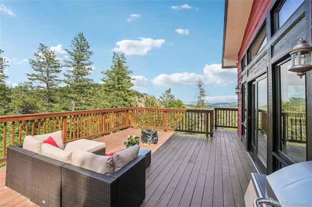 8940 S Brandenburger Dr, Morrison, CO 80465 - deck featuring outdoor lounge area and a grill