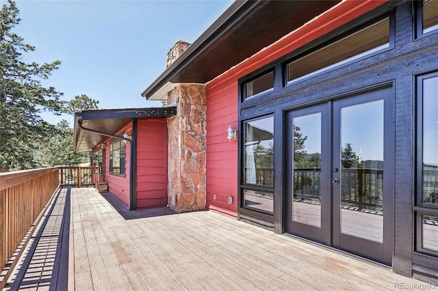 8940 S Brandenburger Dr, Morrison, CO 80465 - wooden deck with french doors