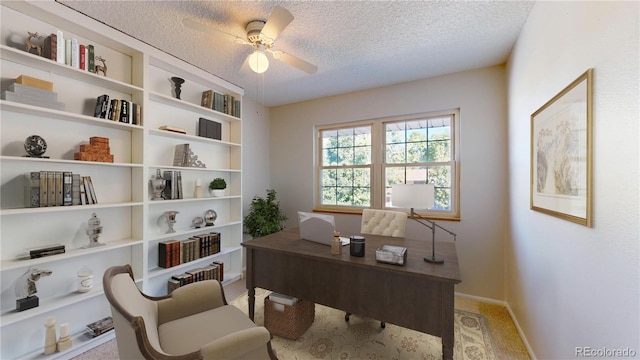 carpeted office space featuring ceiling fan and a textured ceiling