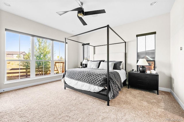 6589 Canyonpoint Rd, Castle Pines, CO 80108 - bedroom with baseboards, a ceiling fan, and carpet