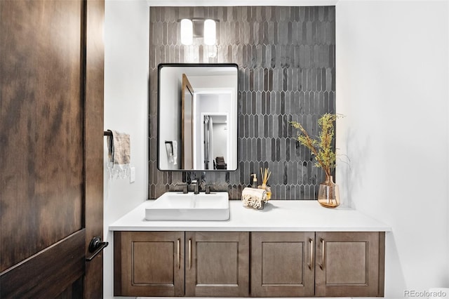 6589 Canyonpoint Rd, Castle Pines, CO 80108 - bathroom with decorative backsplash and vanity