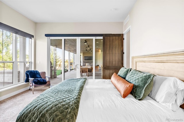 6589 Canyonpoint Rd, Castle Pines, CO 80108 - bedroom featuring baseboards, visible vents, carpet, and access to exterior