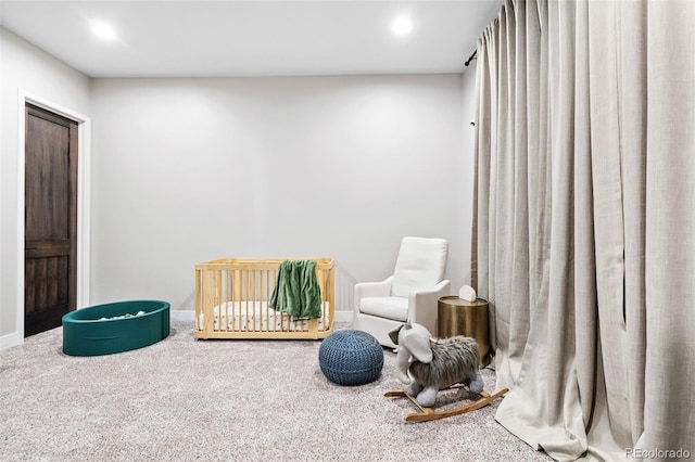 6589 Canyonpoint Rd, Castle Pines, CO 80108 - sitting room with baseboards, carpet floors, and recessed lighting
