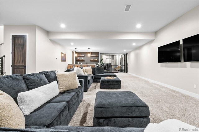 6589 Canyonpoint Rd, Castle Pines, CO 80108 - living room with recessed lighting, carpet, visible vents, indoor bar, and baseboards