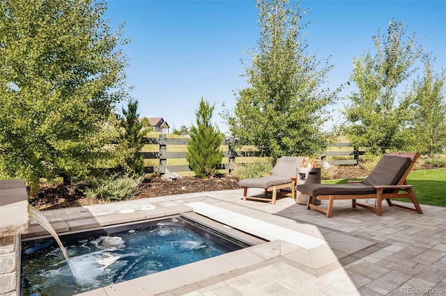 6589 Canyonpoint Rd, Castle Pines, CO 80108 - view of swimming pool featuring an in ground hot tub and a patio