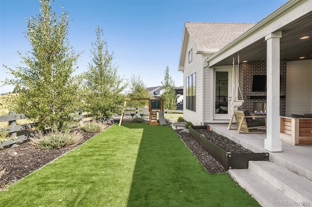 6589 Canyonpoint Rd, Castle Pines, CO 80108 - view of yard with fence and a playground