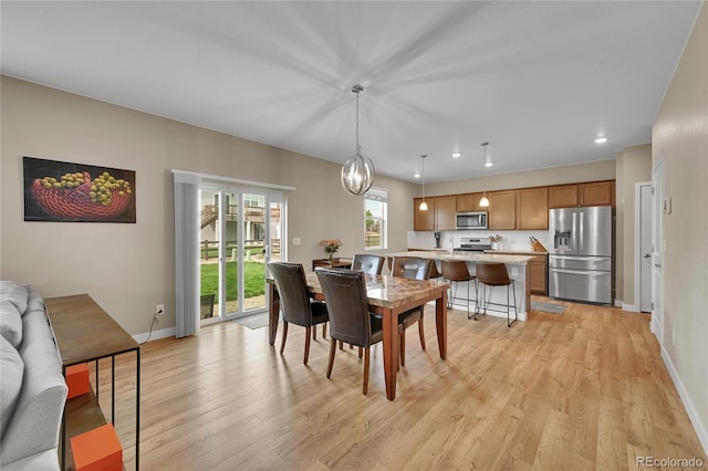 7465 E 157th Pl, Thornton, CO 80602 - dining space with light wood-type flooring, baseboards, and recessed lighting
