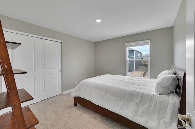 7465 E 157th Pl, Thornton, CO 80602 - carpeted bedroom featuring a closet, baseboards, and recessed lighting