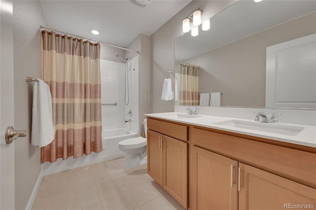 7465 E 157th Pl, Thornton, CO 80602 - full bathroom with tile patterned flooring, shower / bath combo, double vanity, toilet, and baseboards