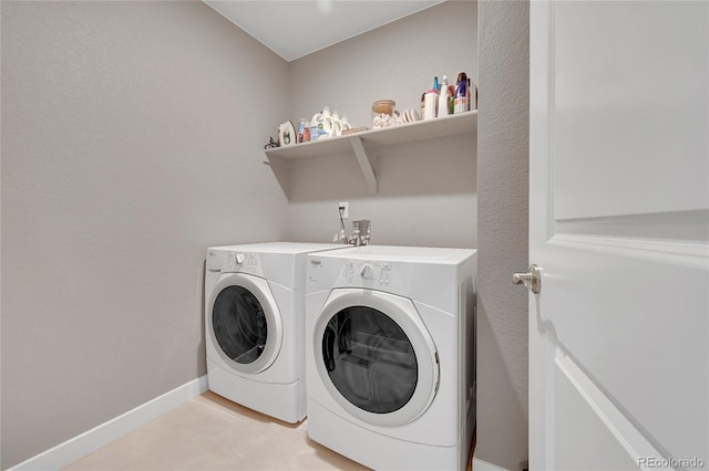 7465 E 157th Pl, Thornton, CO 80602 - laundry room with washing machine and clothes dryer and baseboards