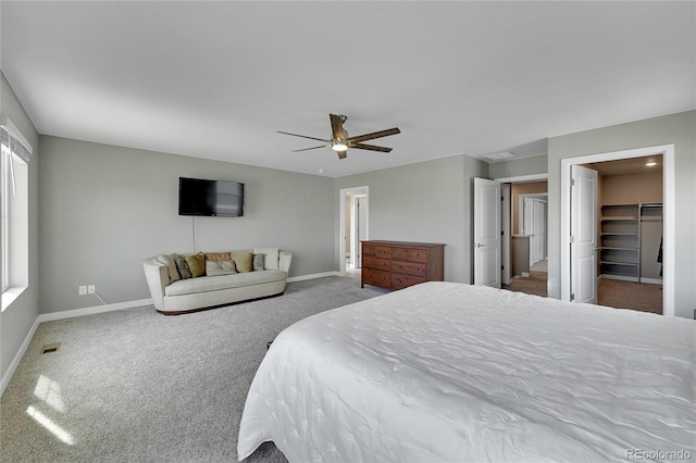 7465 E 157th Pl, Thornton, CO 80602 - carpeted bedroom with baseboards, a ceiling fan, and a spacious closet