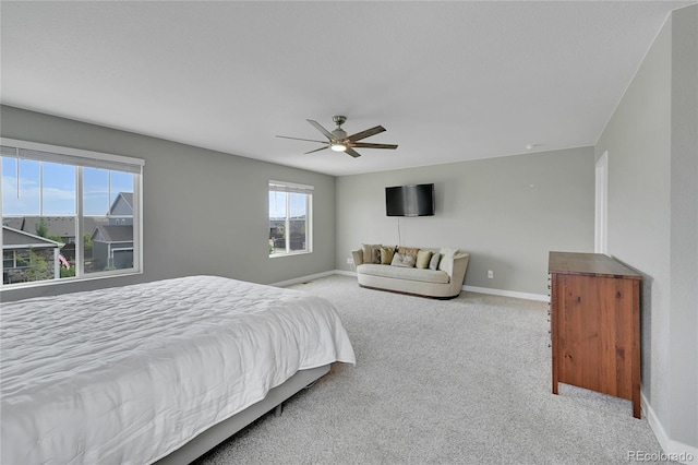 7465 E 157th Pl, Thornton, CO 80602 - carpeted bedroom featuring baseboards and a ceiling fan