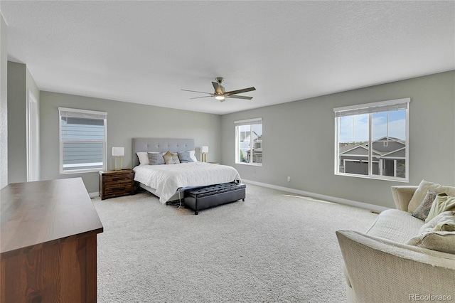 7465 E 157th Pl, Thornton, CO 80602 - bedroom with carpet floors, baseboards, and ceiling fan