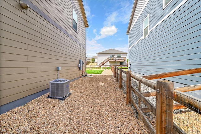 7465 E 157th Pl, Thornton, CO 80602 - view of home's exterior featuring central AC unit and fence