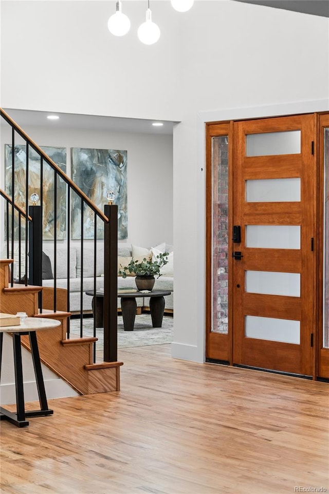 entrance foyer with light hardwood / wood-style floors