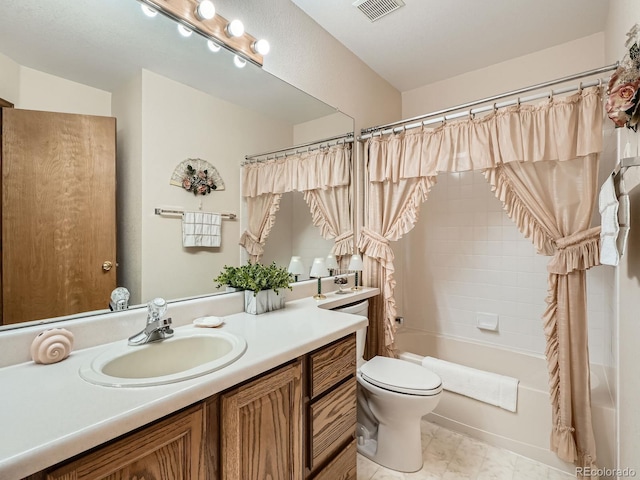 full bath with toilet, shower / bath combo, and vanity