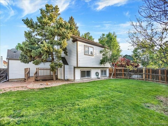 rear view of house with a deck