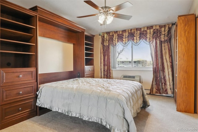 carpeted bedroom featuring ceiling fan, an AC wall unit, and a baseboard heating unit