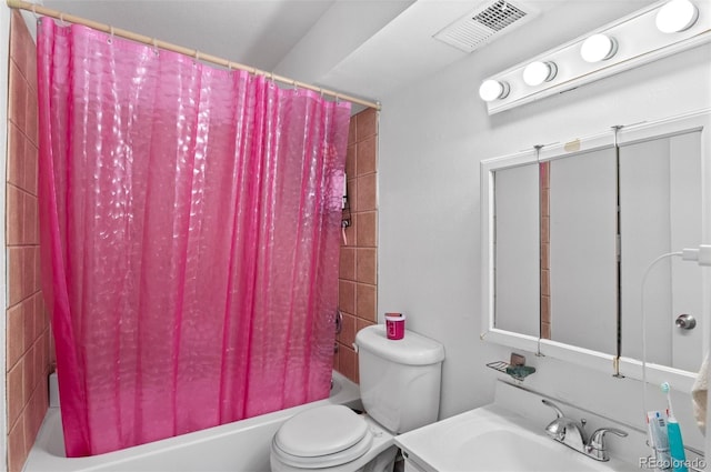 full bathroom with shower / bath combo, toilet, and vanity