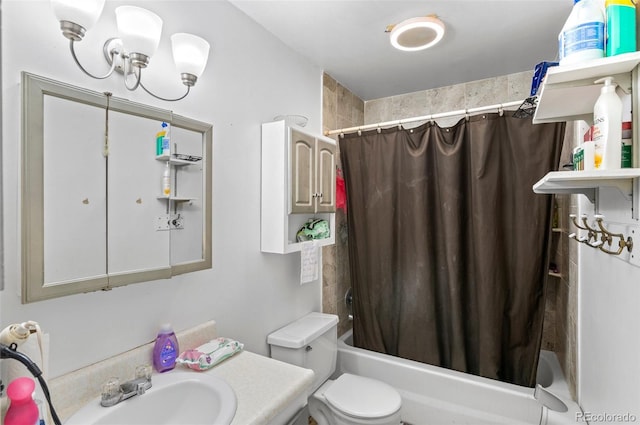 full bathroom with vanity, shower / bath combo, and toilet