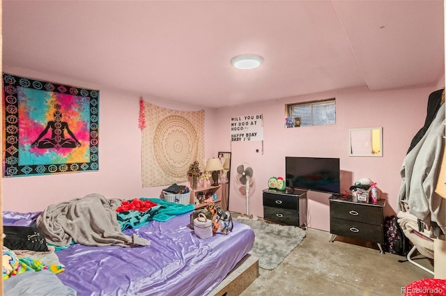 bedroom with concrete flooring