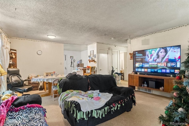 living room featuring light carpet and a textured ceiling