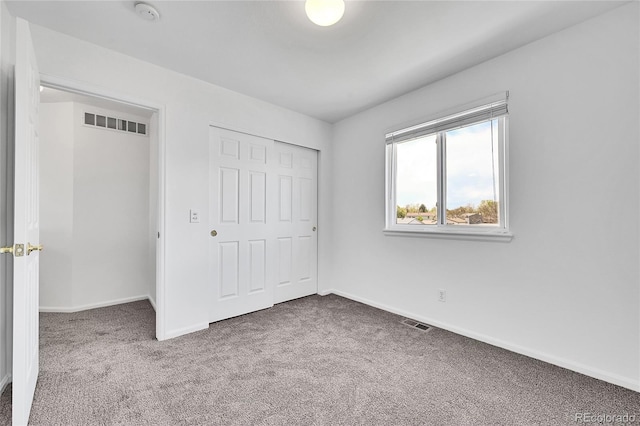11963 Dahlia Dr, Thornton, CO 80233 - unfurnished bedroom with carpet flooring, baseboards, and a closet