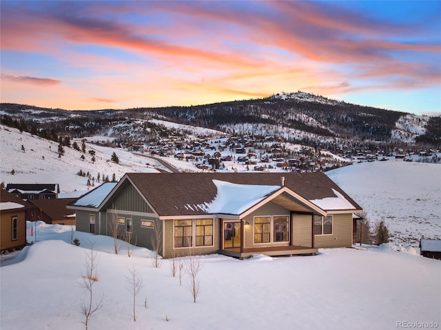 view of front of home with a mountain view