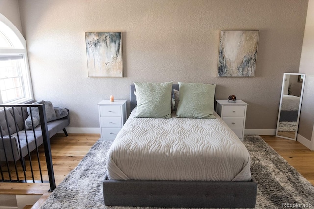 bedroom featuring light hardwood / wood-style flooring