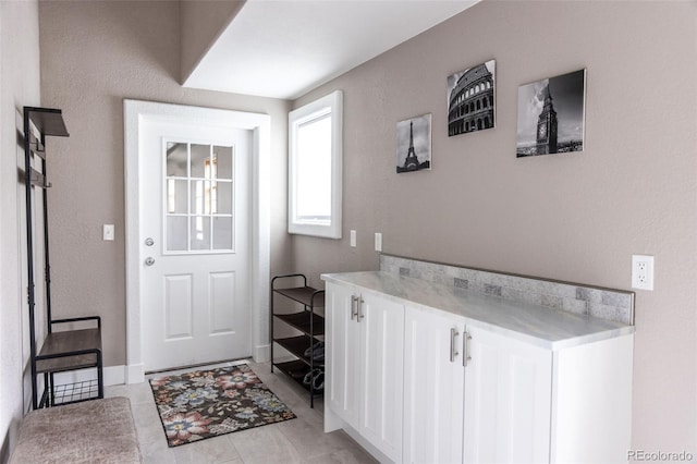 interior space featuring light tile patterned floors