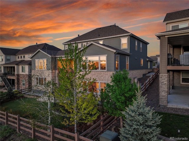 8179 S Kellerman Cir, Aurora, CO 80016 - back of house at dusk with stairs