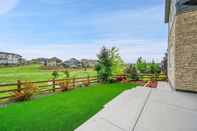 8179 S Kellerman Cir, Aurora, CO 80016 - view of yard with a residential view and a patio area