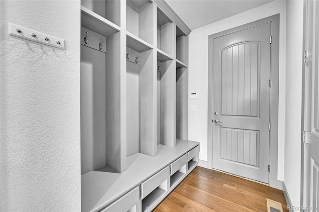 8179 S Kellerman Cir, Aurora, CO 80016 - mudroom featuring wood finished floors