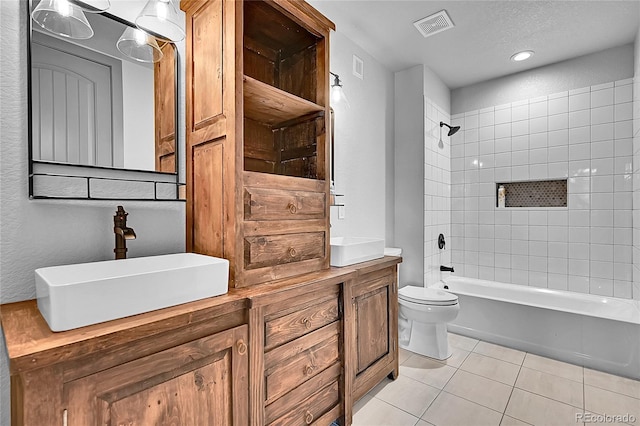8179 S Kellerman Cir, Aurora, CO 80016 - full bathroom featuring tile patterned flooring, double vanity, toilet, bathing tub / shower combination, and recessed lighting