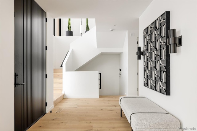 corridor featuring light hardwood / wood-style flooring