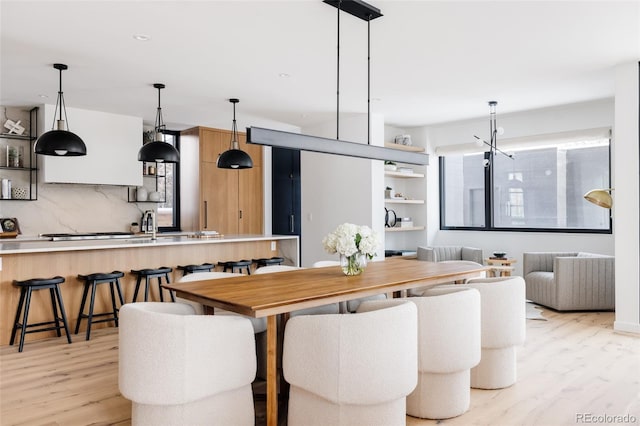 dining room featuring light wood-type flooring