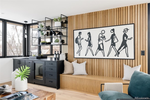 sitting room with light hardwood / wood-style flooring